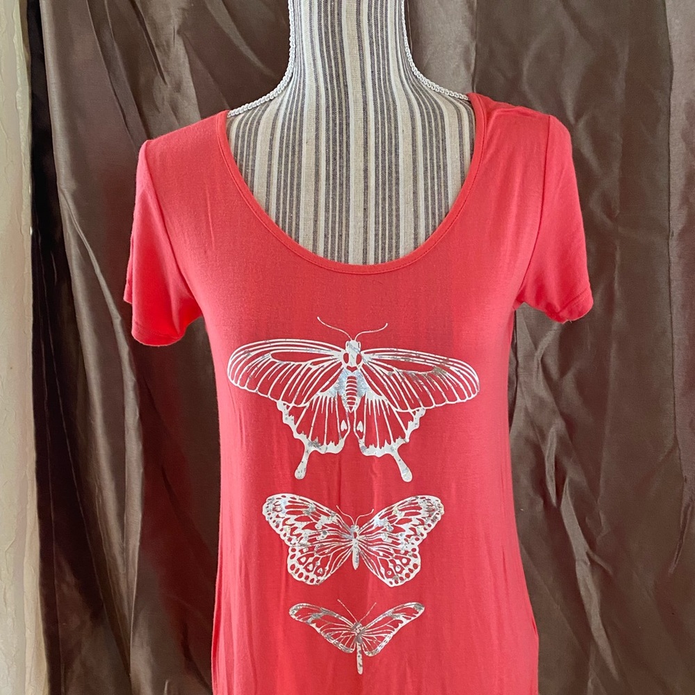 Coral with silver butterflies; lacy back yoke.